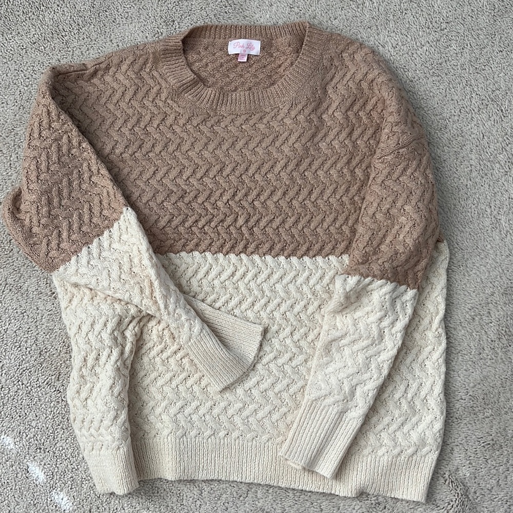 Never worn Pink Lily sweater